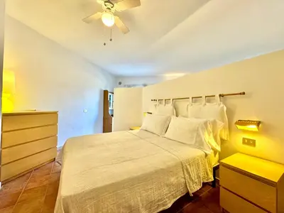 Letto o letti in una camera di Sunset Villa Apartments