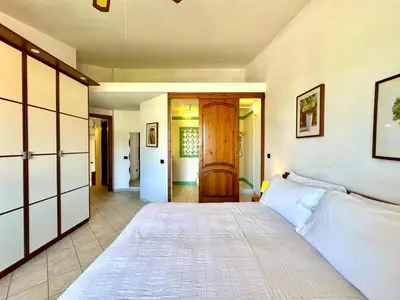 Letto o letti in una camera di Sunset Villa Apartments