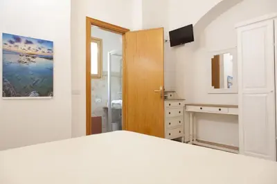 Letto o letti in una camera di Guest house Acuario
