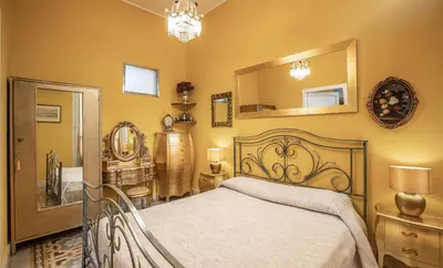 Letto o letti in una camera di Centro Storico