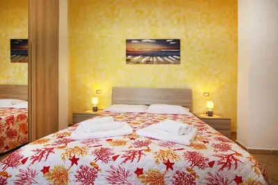 Letto o letti in una camera di Domos Sa Murta - Sa Murta Apartments
