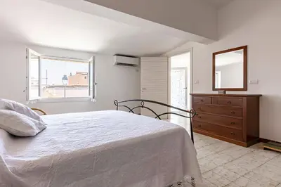 Letto o letti in una camera di GuestHost - Casa Suentu
