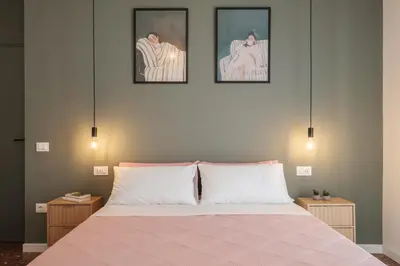 Letto o letti in una camera di Casa Cate - Modern Apt - Historic Centre Apartment