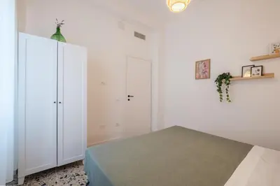 Letto o letti in una camera di Casa Cate - Modern Apt - Historic Centre Apartment