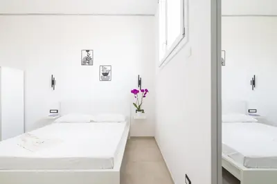 Letto o letti in una camera di EnSe Affittacamere