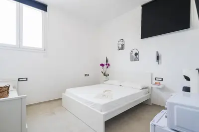 Letto o letti in una camera di EnSe Affittacamere