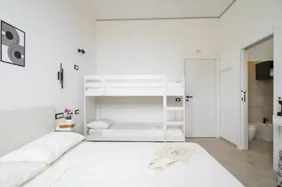 Letto o letti in una camera di EnSe Affittacamere