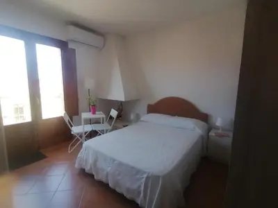 Letto o letti in una camera di Relix