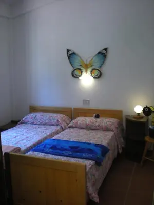 Letto o letti in una camera di Casa Vacanza Solanas