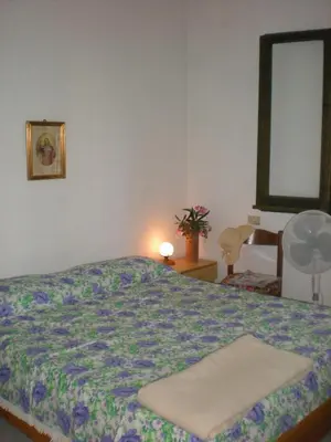 Letto o letti in una camera di Casa Vacanza Solanas