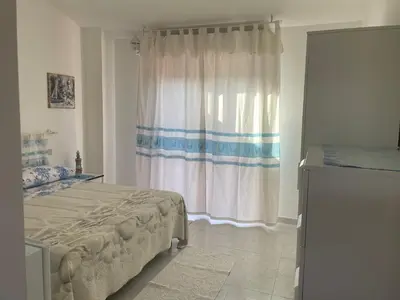 Letto o letti in una camera di Sweet Home Pia