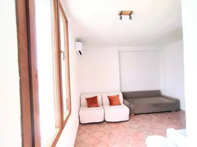 Area soggiorno di ENJOY HOUSE SARDINIA vista mare