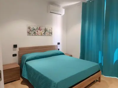Letto o letti in una camera di Casa Tiddia