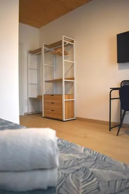 Letto o letti in una camera di La Casa di Legno