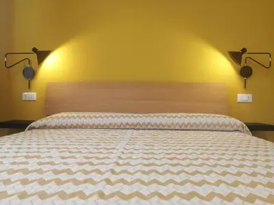 Letto o letti in una camera di La Casa di Legno