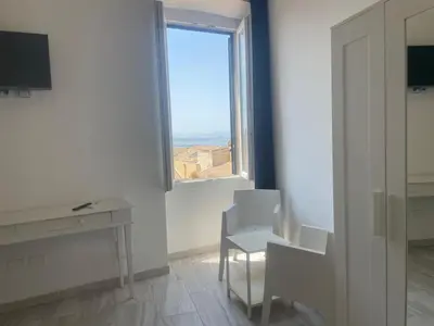 TV o dispositivi per l'intrattenimento presso Suite Palazzo Siotto