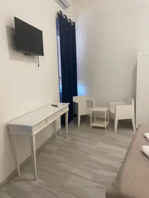 TV o dispositivi per l'intrattenimento presso Suite Palazzo Siotto