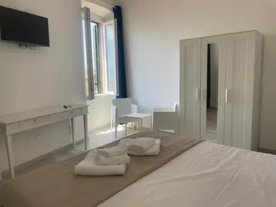 Letto o letti in una camera di Suite Palazzo Siotto
