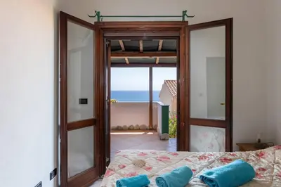 Letto o letti in una camera di Casa Fenicottero - Pet Friendly - Funtana Meiga