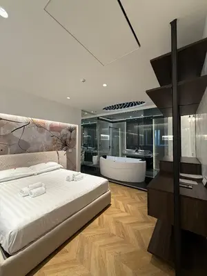Letto o letti in una camera di Saretta Luxury Suites