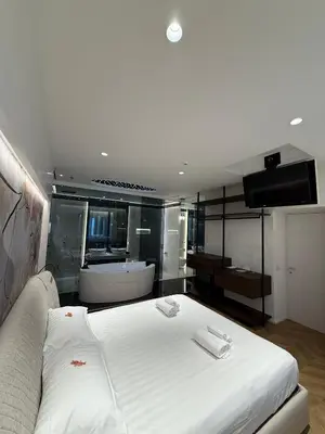 Letto o letti in una camera di Saretta Luxury Suites