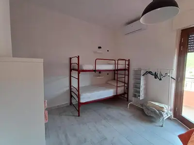 Letto o letti in una camera di Dimora mediterranea Fontanamare