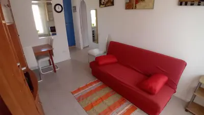 Area soggiorno di Donigala Fenughedu Apartment