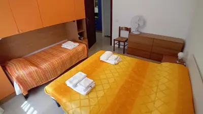 Letto o letti in una camera di Donigala Fenughedu Apartment