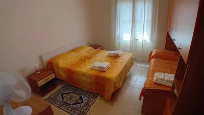 Letto o letti in una camera di Donigala Fenughedu Apartment