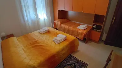 Letto o letti in una camera di Donigala Fenughedu Apartment
