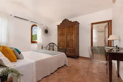 Letto o letti in una camera di Su Scannu - Stylish Beach apartment with Lounge terrace