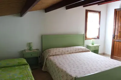 Letto o letti in una camera di Albatros