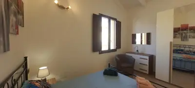 Letto o letti in una camera di Casa indipendente - Residenza Tre Archi