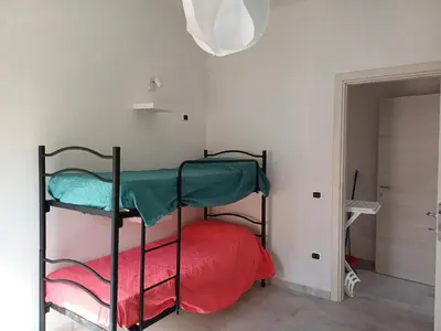 Letto o letti in una camera di Dimora Mediterranea Portopaglia