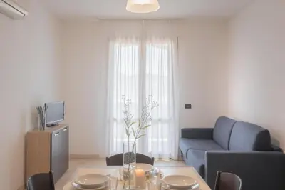Area soggiorno di Stylish Residence Le Fontane 1 bedroom Apartment sleeps 4 person-No6887