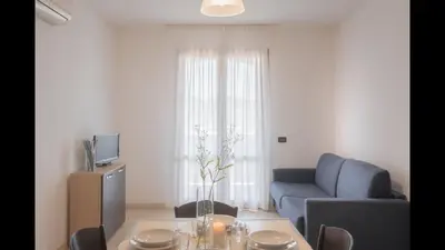 Area soggiorno di Stylish Residence Le Fontane 1 bedroom Apartment sleeps 4 person-No6887