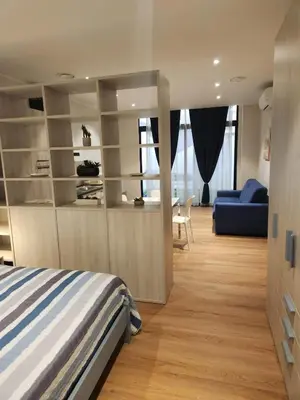 Letto o letti in una camera di sole & luna house cagliari