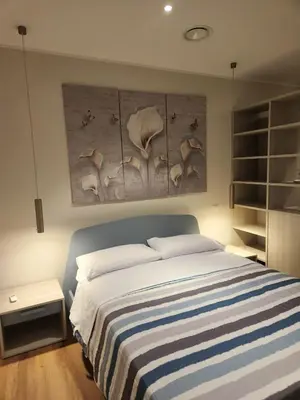 Letto o letti in una camera di sole & luna house cagliari