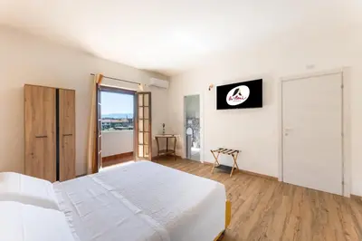 TV o dispositivi per l'intrattenimento presso Sa Meri B&B