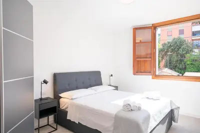Letto o letti in una camera di Tristani Apt