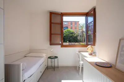 Letto o letti in una camera di Tristani Apt