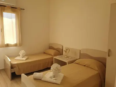 Letto o letti in una camera di Mariposa