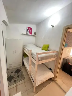 Letto o letti in una camera di Namasté Suite - Porto Pino