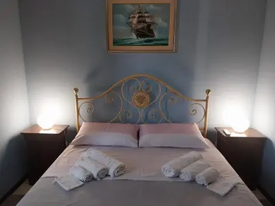 Letto o letti in una camera di Borgo nuovo