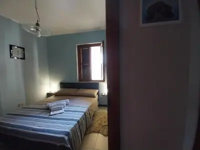 Letto o letti in una camera di Borgo nuovo