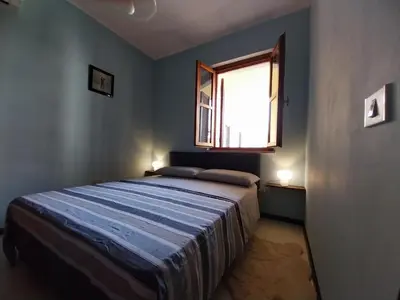 Letto o letti in una camera di Borgo nuovo
