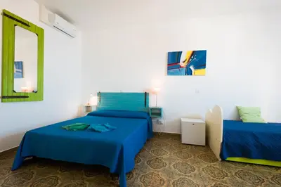Letto o letti in una camera di B&B BentueMari