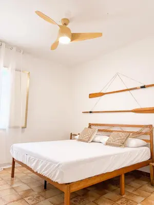 Letto o letti in una camera di Kalma - Beachfront Slow Life at Fisherman Village