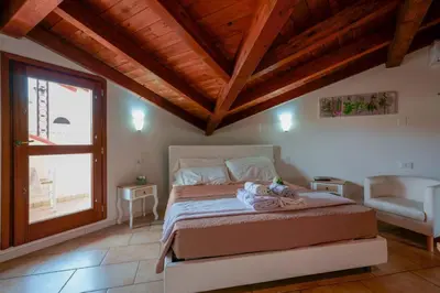 Letto o letti in una camera di Casa Nostra