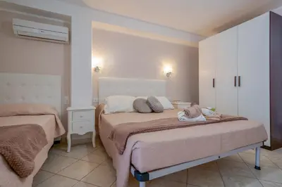 Letto o letti in una camera di Casa Nostra